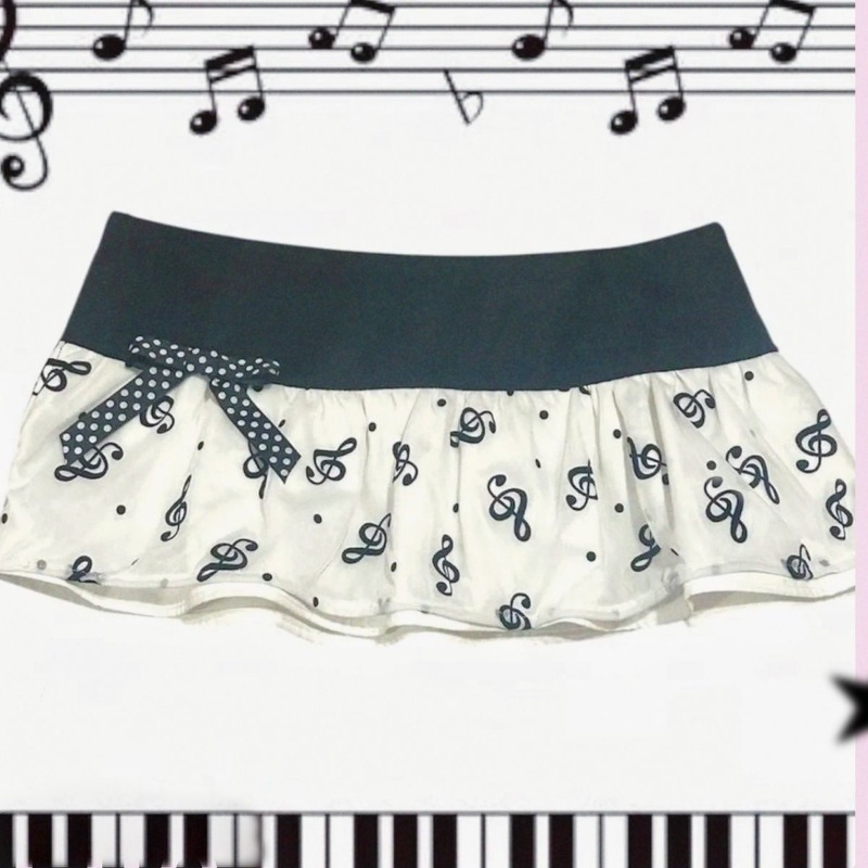 Music - Minigonna con stampa di note musicali
